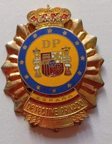 Fotografía original de la placa de un detective privado.